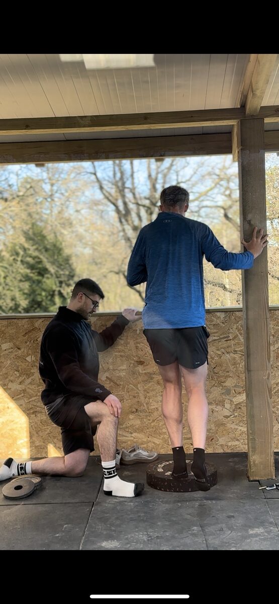 Athlete training with good form in gym